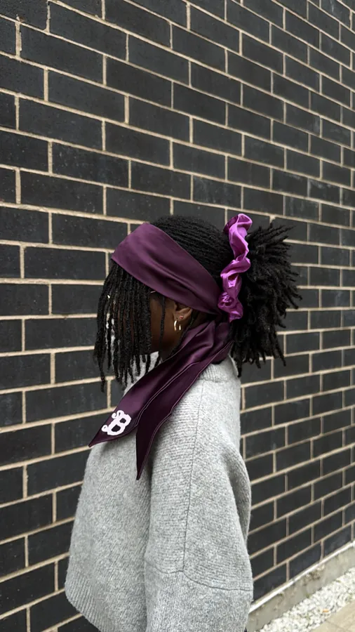The Braid silk scarf and satin scrunchie worn in locs