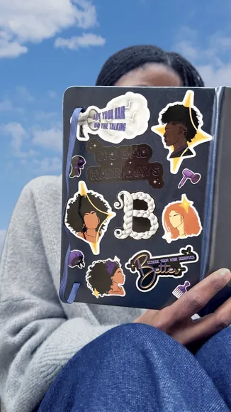 Laptop covered in Braid stickers